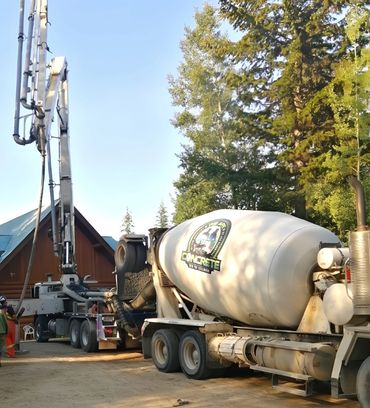 Concrete mixer truck on residential site
