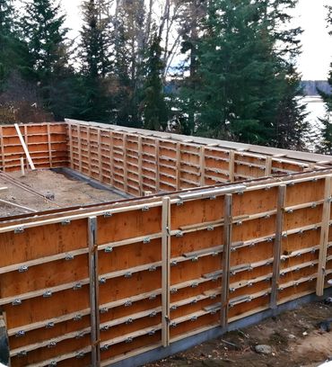 Driveway concrete forms in front of garage
