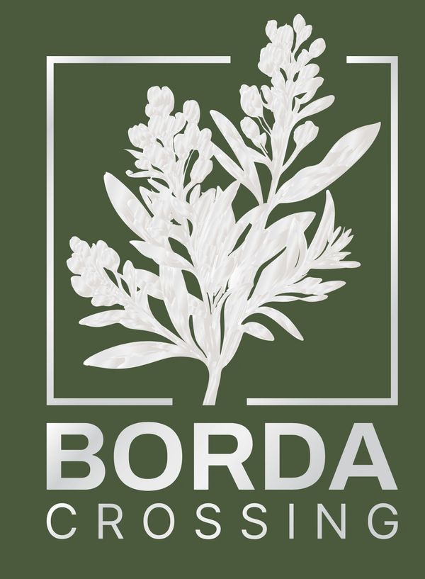 Elegant white floral logo with 'Borda Crossing' text on green background.
