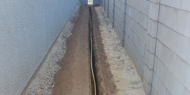 water supply line run for exterior watering system.