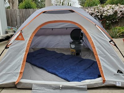 Example of a tent with a camp toilet inside.