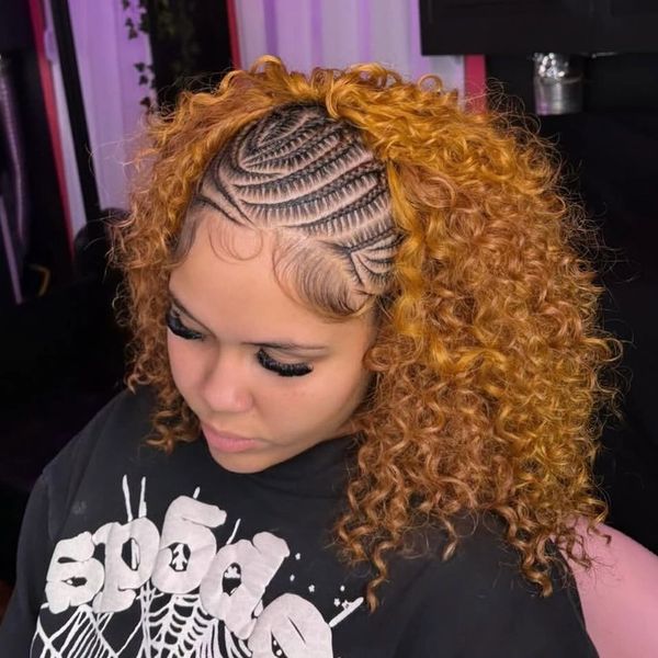 Woman with intricate cornrows and curly hair.