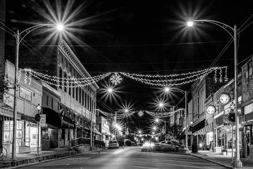main street christmas stores black white photograph picture image