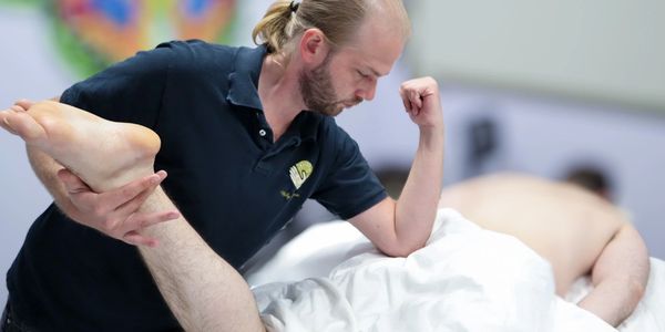 Therapist performing Myofascial Release Therapy in Sugar Land, TX.