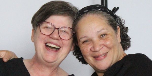 Happy client with trusted massage therapist after craniosacral therapy at Wholly Spirit Hands.