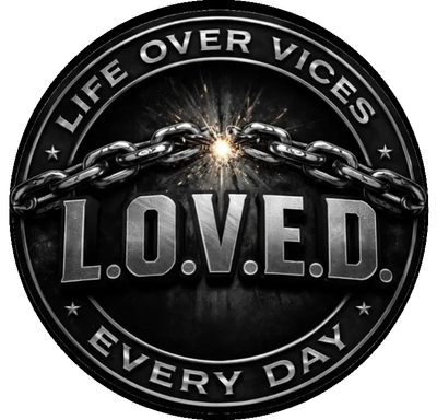 Metal emblem with chain breaking, slogan life over vices.