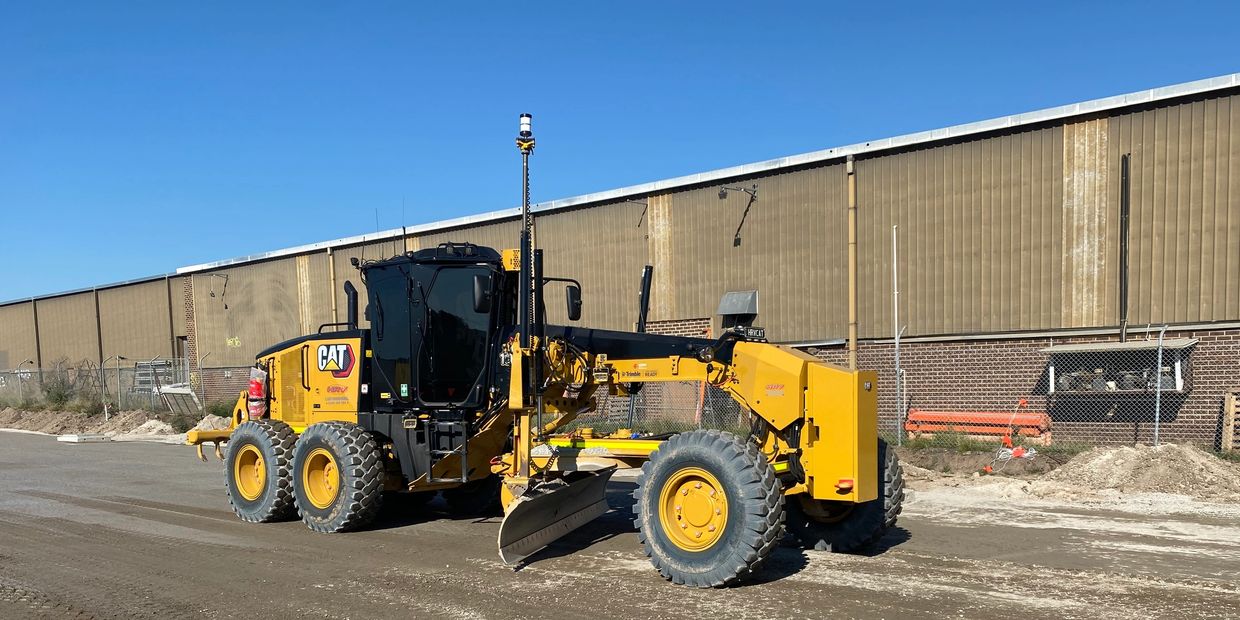 Our cat 150 awd (6wheel drive) grader trimming cement treated crushed rock