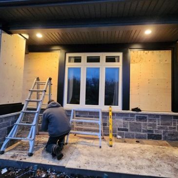 Trifecta Aluminum installers completing custom capping on a home in Tillsonburg, Ontario.