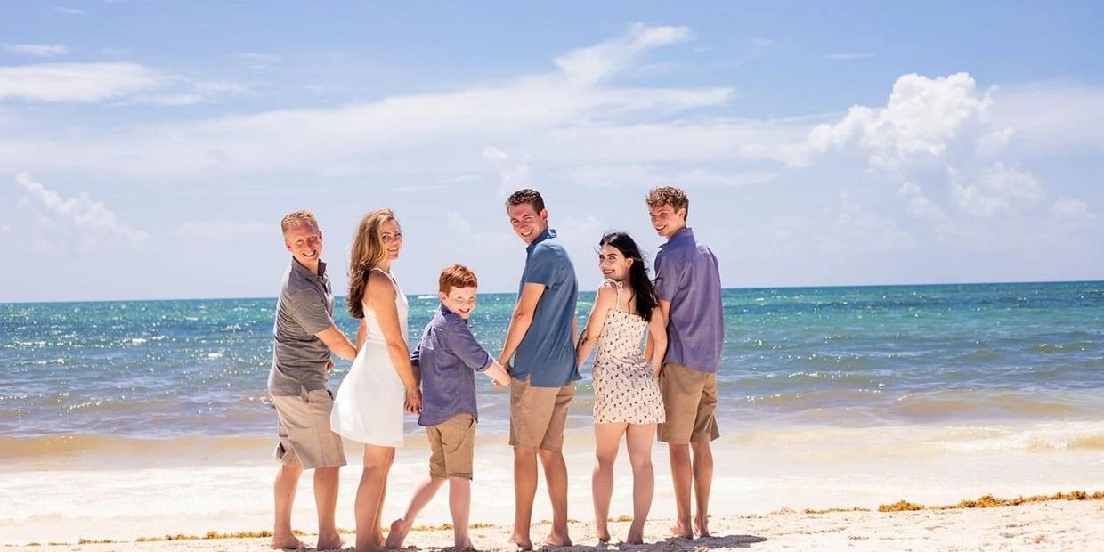 Family portrait of the owners and their family. 