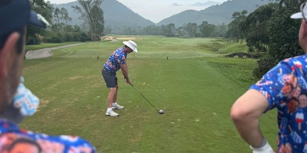 Charles Neer teeing off at Laguna Lang Co golf course in Vietnam