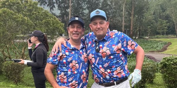 Derek Myron (R) standing with friend Tony Trolinger at Laguna Lang Co golf course in Vietnam