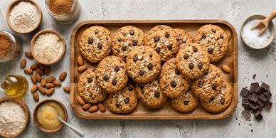 A pan of delicious chocolate chip cookies with dark chocolate chips.