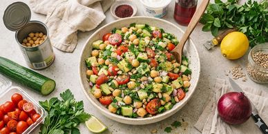 Fresh chickpea and vegetable salad with herbs and lemon.