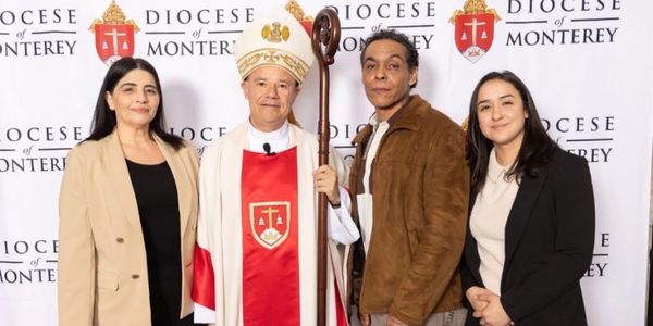 Group photo with a bishop and three other people.