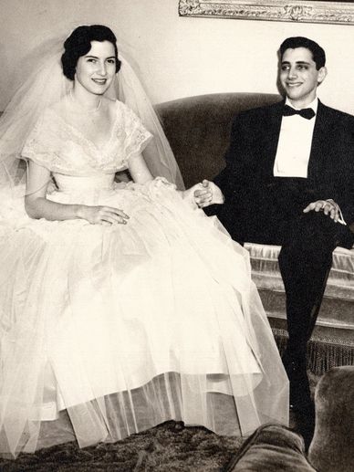 doris with husband sitting on the chair and looking ahead