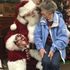Senior enjoys holiday time with Santa Clause at Gentog Intergenerational Adult Day Center