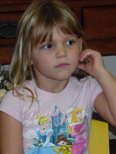 A child takes a photo at Gentog Intergenerational Daycare in Tigard, OR