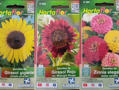Paquetes de semillas de girasol y zinnia para jardín.