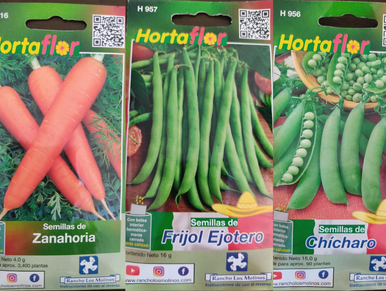 Paquetes de semillas de zanahoria, frijol ejotero y chícharo.