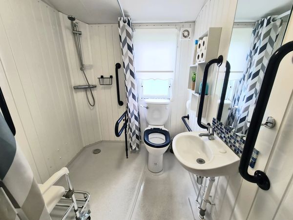 Accessible wet room in static caravan.