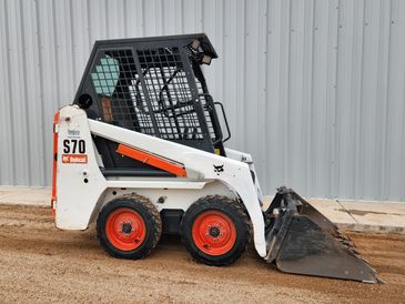S70 bobcat, tractors, extended reach fork lift, trenchers, delivery, dump trailers, skid steer