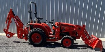 Kubota loader with backhoe bucket, tractor rental, excavating, equipment rentals