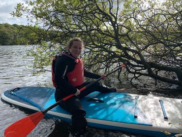 Paddle boarding in the lake district. 