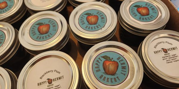 Jars of blackberry plum preserves from Happy Hermit Bakery.