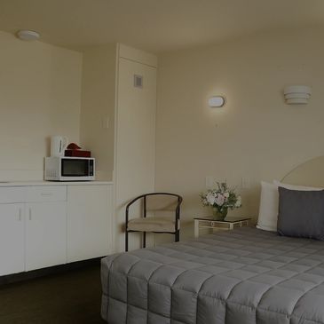 Bed with kitchenette 