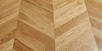 Oak engineered chevron flooring: elegant V‑shaped pattern. fitted in loughton.