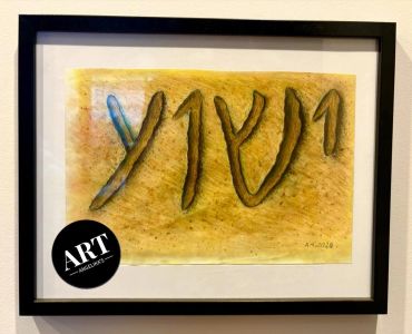 Framed artwork with abstract symbols on a textured yellowish background.