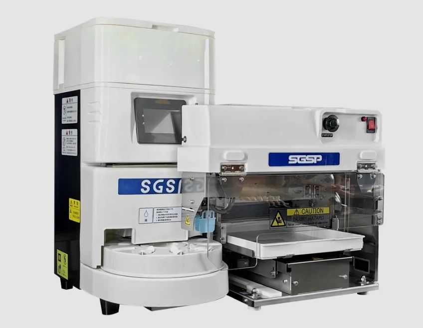 White SGS laboratory machine with digital screen and safety warnings.