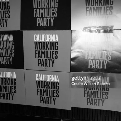 Multiple posters displaying 'California Working Families Party' in black and white.