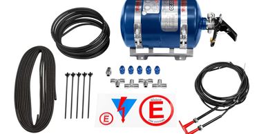 Blue fire suppression system kit with hoses, fittings, and labels.