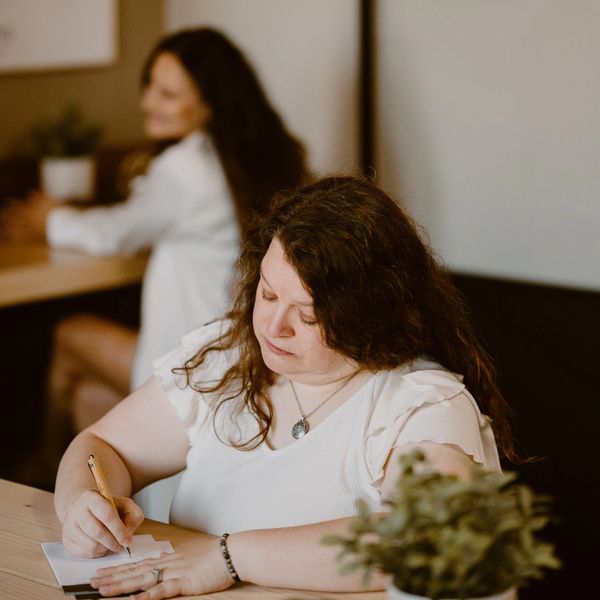 two women at desks