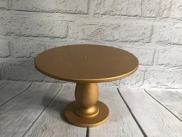 Wooden tear drop gold cake stand