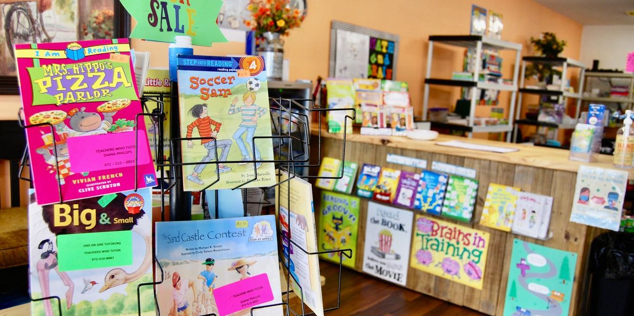 A Picture of books placed on the stand at the entrance
