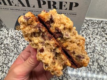 A chewy cookie packed with melty chocolate chips, crunchy walnuts, and sweet Heath toffee bits in ev