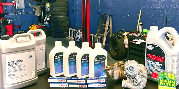 Top quality car products placed on a table at a mechanic shop