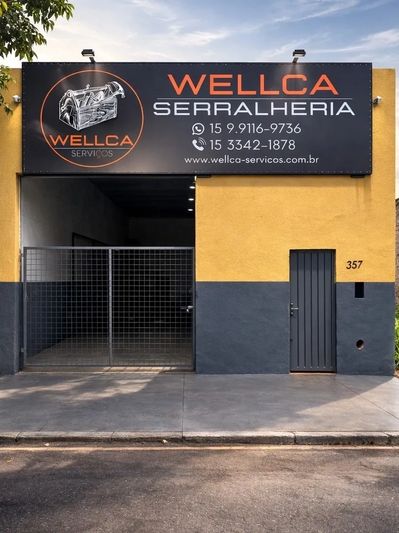 Facade of Wellca Serralheria with contact details and entrance.