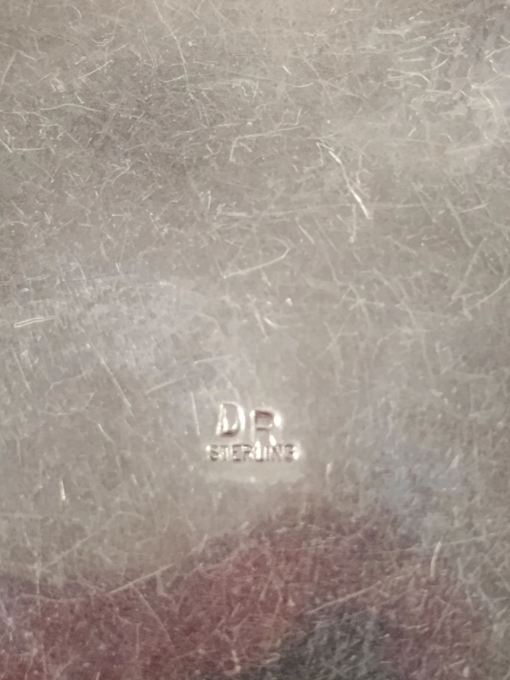 Close up of the sterling silver stamp