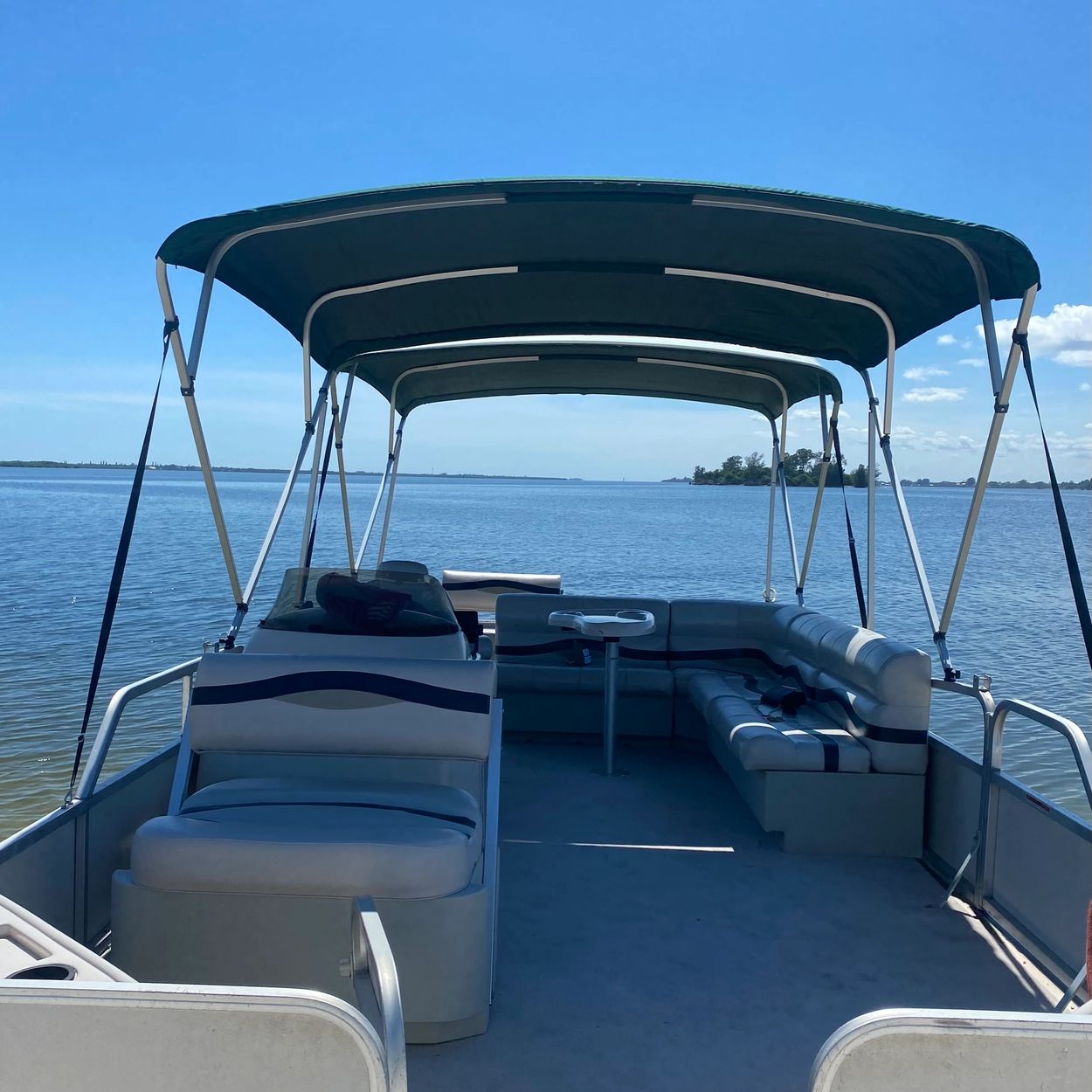Enjoy your boat tours and inshore fishing charters aboard this comfortable, 24’ Pontoon boat with 2 