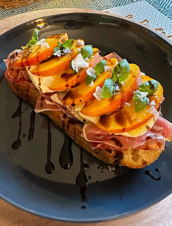 Open Faced Sandwich with Peach, Burrata, Prosciutto and Balsalmin Vinegar