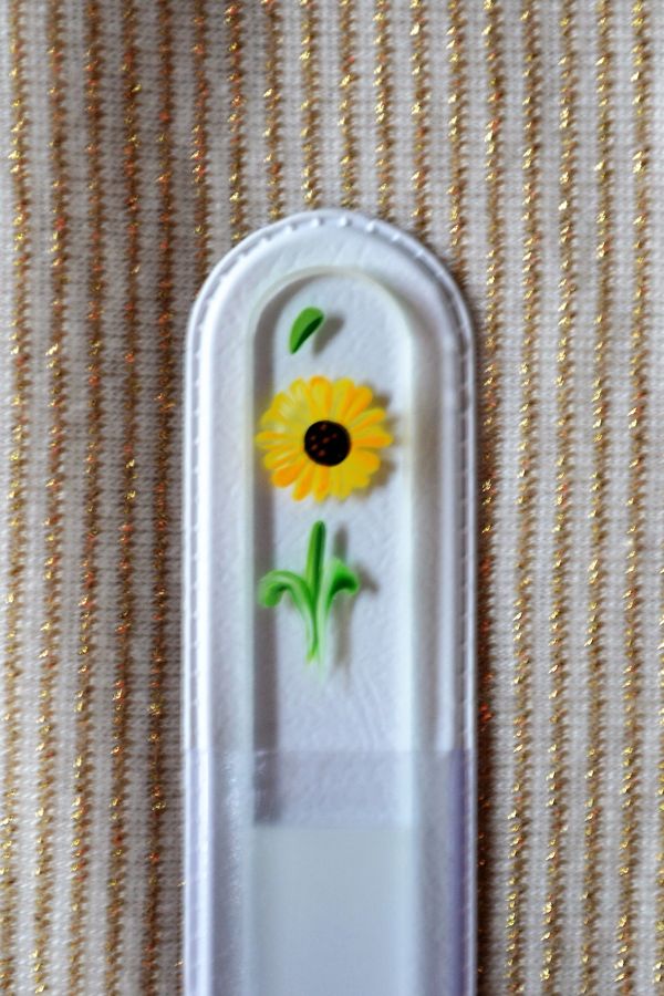 Sunflower hand painted on a clear Crystal glass fingernail file. 