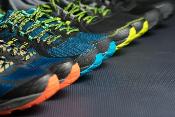 Closeup shot of different color shoes