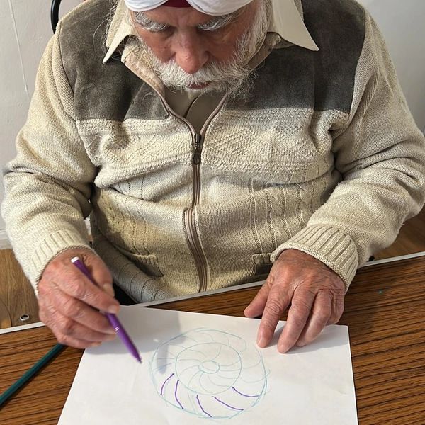 Elderly  from Nirvana Adult Day  Care Centre Slough man drawing