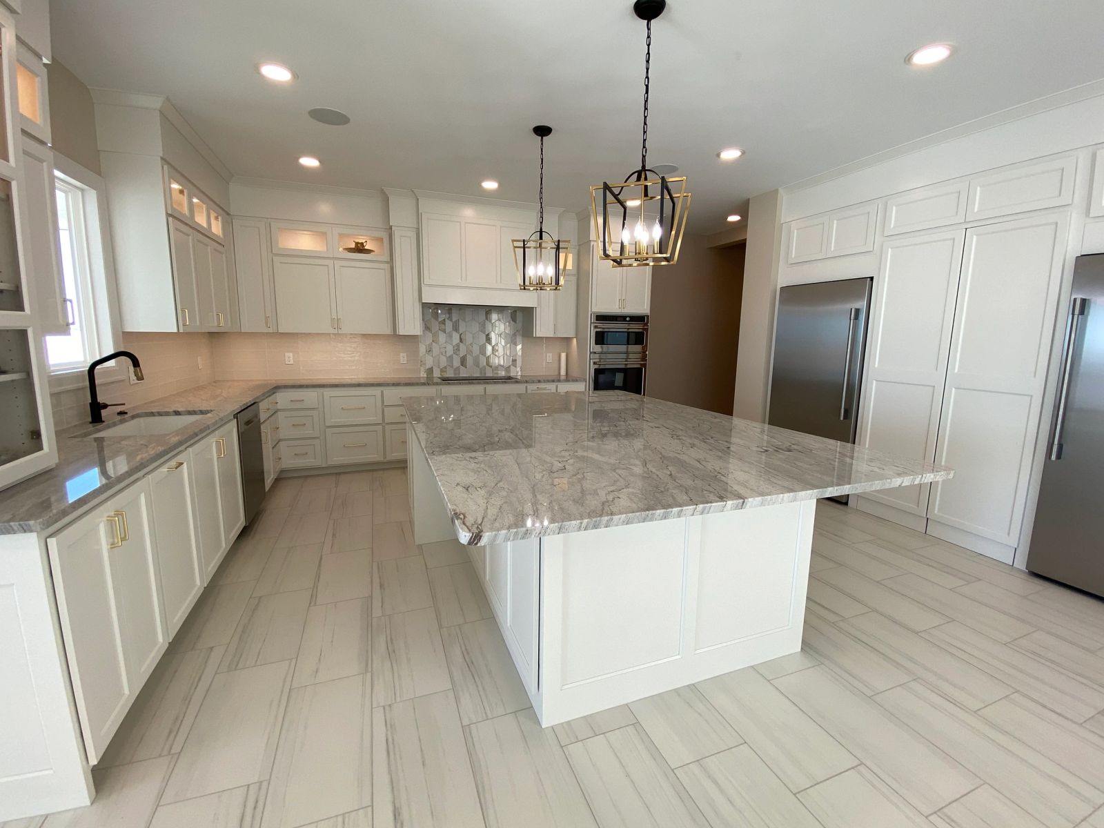Newly completed custom home exterior at dusk in Sioux Falls, South Dakota