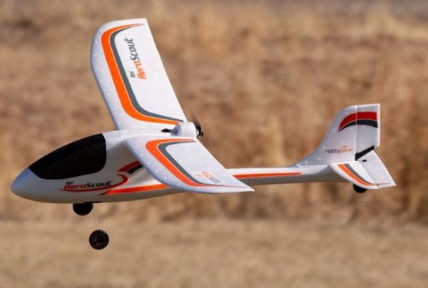 A small remote-controlled airplane in flight.