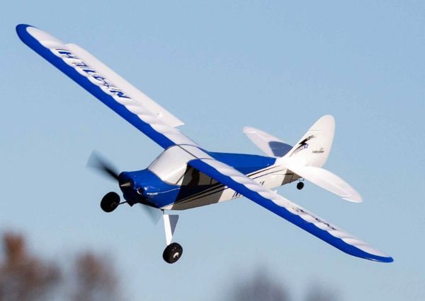 Remote-controlled model airplane in flight.