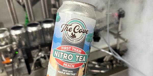 The Cove Beverage Company can of First Thaw Nitro Tea Peach from canning line. 